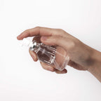 Pressing the pump of the Überlube Signature Bottle