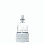 Überlube Signature Bottle standing on a light background